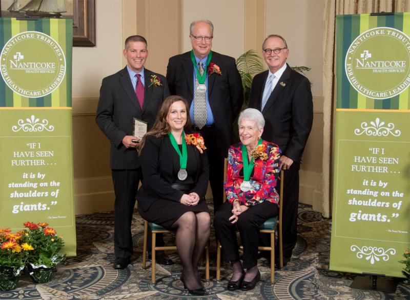 Three individuals were honored at Nanticoke’s 13th Annual Tributes for Healthcare Leadership Dinner. (Front Row L-R) Amy Proctor of the Trinity Foundation, Charles C. Allen, Jr. Leadership in Philanthropy Award Recipient; and Nancy Cook Marsh, Founders Award Recipient. (Back Row, L-R) Gregg Massey of the Trinity Foundation, Charles C. Allen, Jr. Leadership in Philanthropy Award Recipient; Dr. James F. Palmer, Physician Hall of Fame Inductee; and Nanticoke Health Services President & CEO, Steven A. Rose.